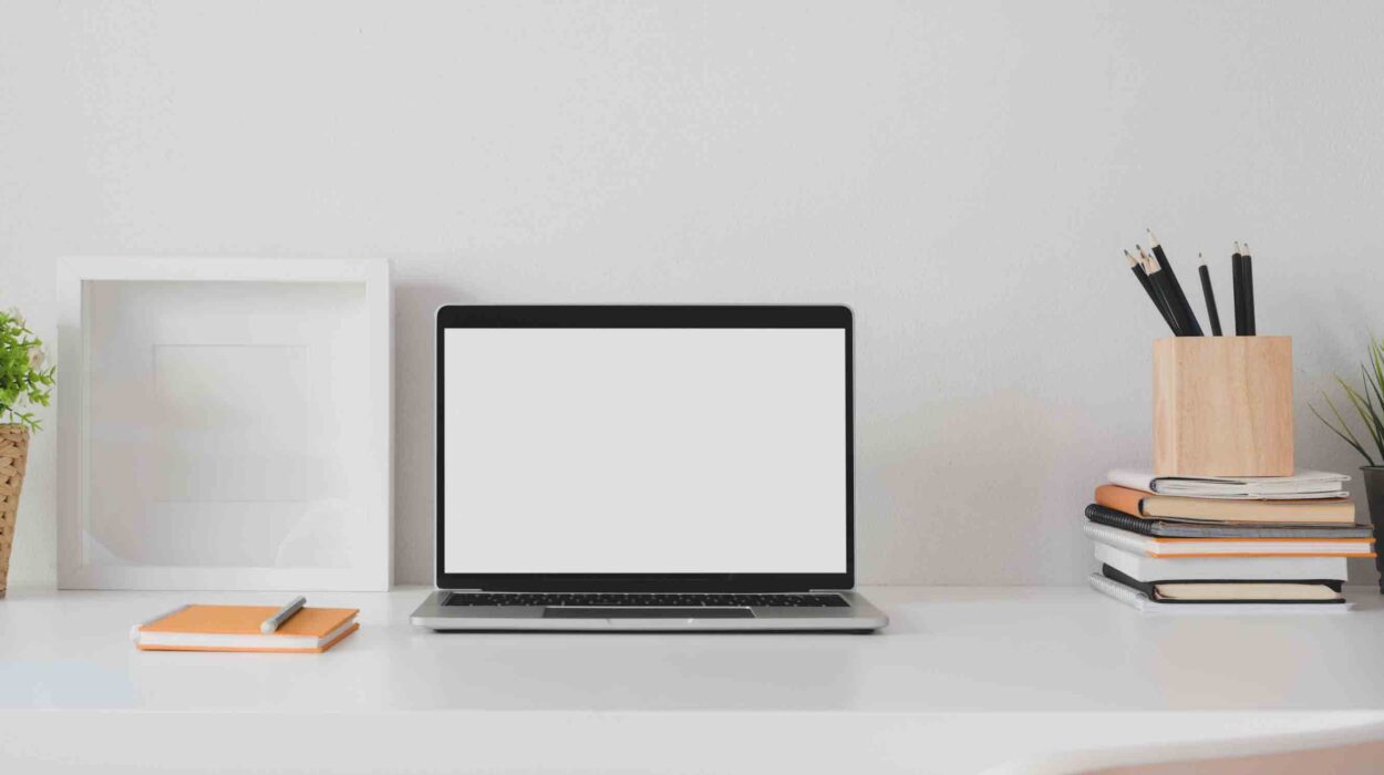 macbook-pro-on-white-table-3787308